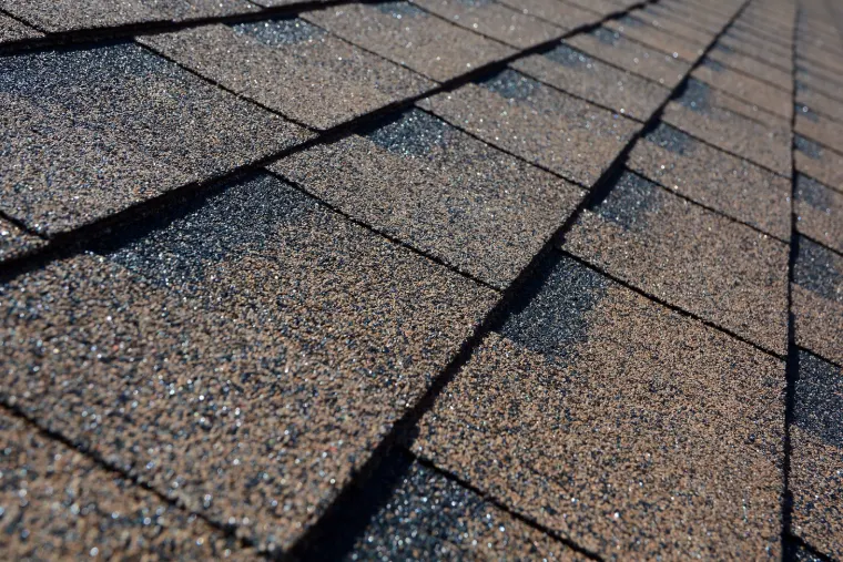 Close-up of finished asphalt shingle roofing