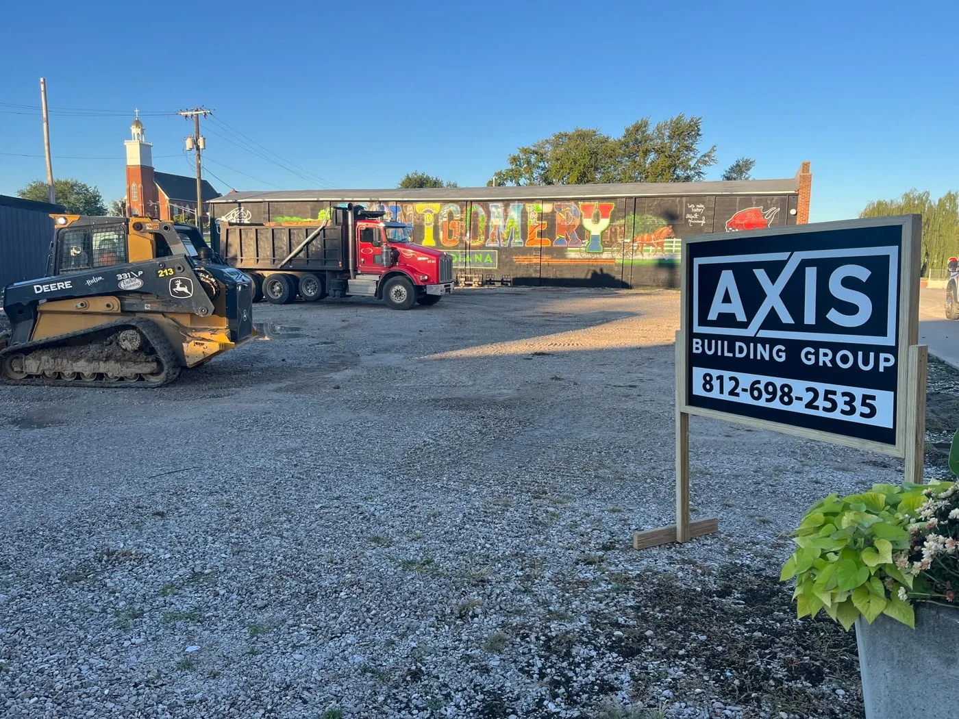 AXIS Building Group equipment and job site sign in Montgomery, Indiana